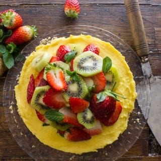 Fresh Fruit Tart with Italian Cream Filling, an easy delicious pie recipe, a graham cracker crust, creamy filling and heaps of fresh fruit.