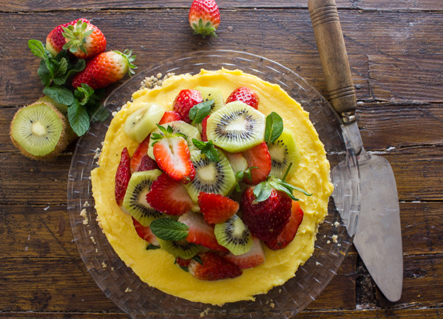 Fresh Fruit Tart with Italian Cream Filling, an easy delicious pie recipe, a graham cracker crust, creamy filling and heaps of fresh fruit.