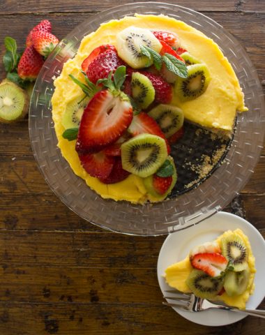 Fresh Fruit Tart with Italian Cream Filling, an easy delicious pie recipe, a graham cracker crust, creamy filling and heaps of fresh fruit.