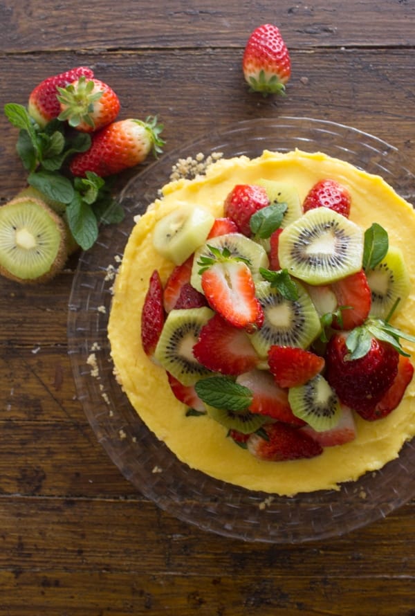 Fresh Fruit Tart with Italian Cream Filling, an easy delicious pie recipe, a graham cracker crust, creamy filling and heaps of fresh fruit.