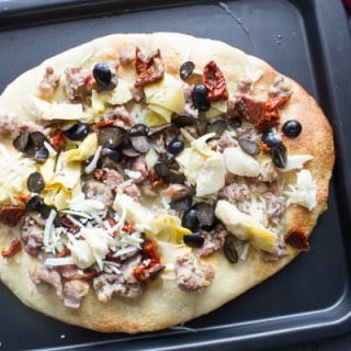 Italian Sausage Artichoke Cheese Pizza, pre-made or homemade dough, fast and easy. A healthy Italian white pizza recipe.
