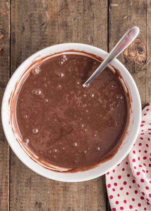 The cocoa and sweetened condensed milk mixed in a bowl.