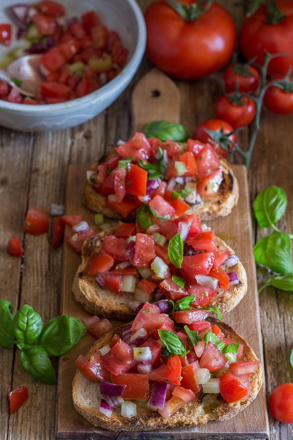 bruschetta with tomato on a wooden board