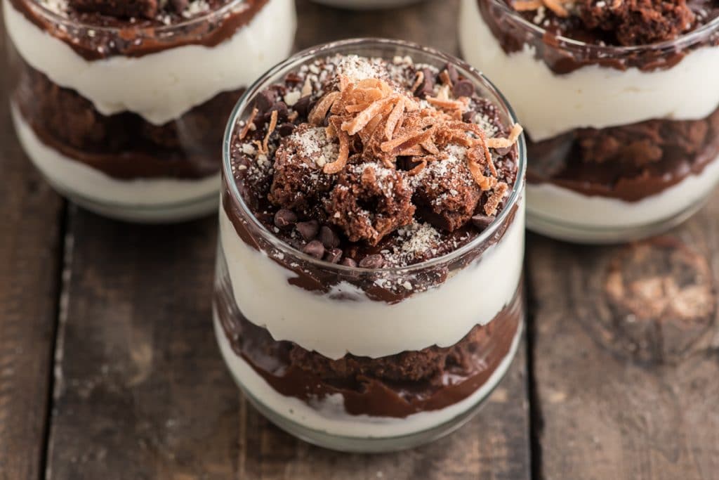 Up close brownie parfait in a glass.