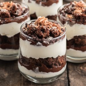 Brownie parfait on a brown board.