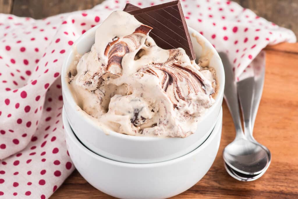 Coffee ice cream in a white dish.