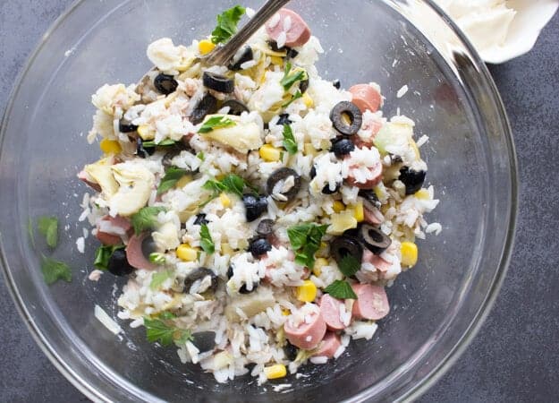 Mediterranean Rice Salad Bowl is a simple, fast cold Italian summer salad recipe. Full of veggies, tuna and fresh herbs. Healthy & Delicious.