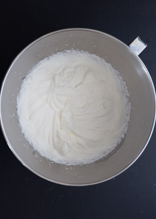 Cream whipped in a bowl.