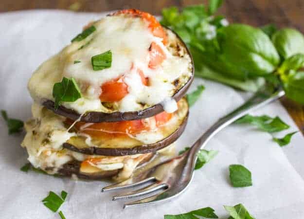 An easy healthy grilled Eggplant and Tomato Recipe. Baked Eggplant Stacks made with Parmesan and Mozzarella, the perfect dinner meal.