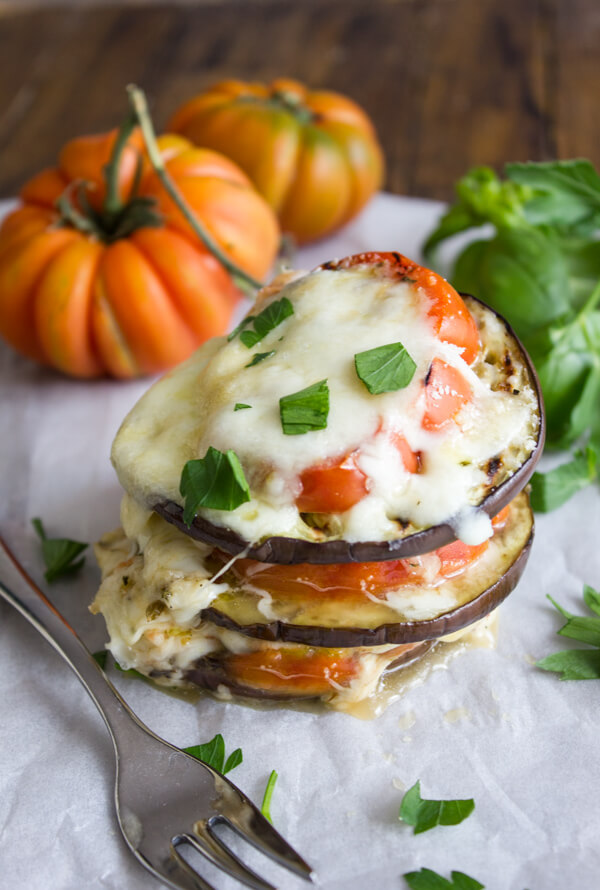 An easy healthy grilled Eggplant and Tomato Recipe. Baked Eggplant Stacks made with Parmesan and Mozzarella, the perfect dinner meal.