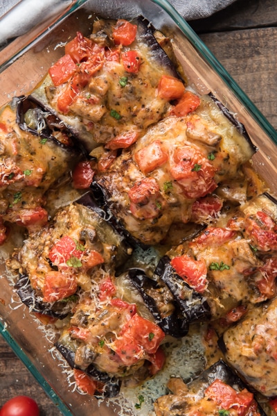 the baked eggplant rollups in the pan.