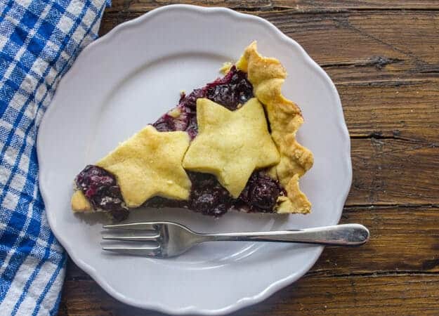 An Easy Italian Dessert Recipe, Blueberry Crostata made with a tasty fresh blueberry filling in a buttery flaky crust. Delicious.