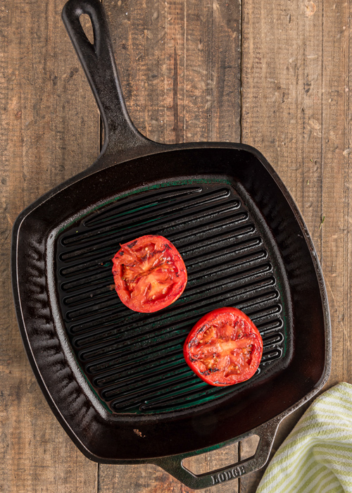 Grilling the tomatoes on a pan grill.