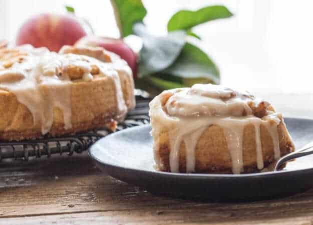 Apple Butter Cinnamon Rolls a quick and easy no yeast dough filled with a yummy Apple Butter filling and topped with a creamy Maple Glaze. 
