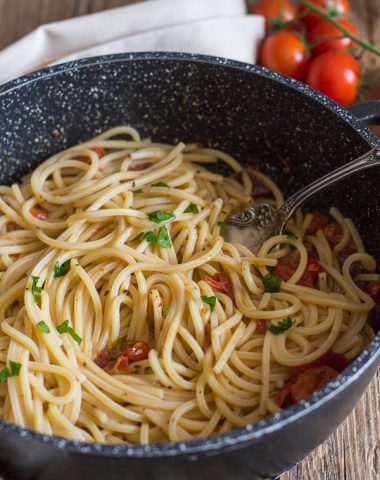 anchovy pasta in a black pan