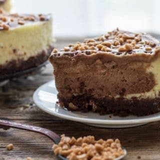 Vanilla and Dark Chocolate make this Homemade Vanilla Chocolate Cheesecake the Best Decadent Dessert.Perfect sprinkled with Skor Toffee Bits.