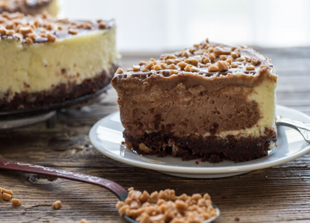 Vanilla and Dark Chocolate make this Homemade Vanilla Chocolate Cheesecake the Best Decadent Dessert.Perfect sprinkled with Skor Toffee Bits.