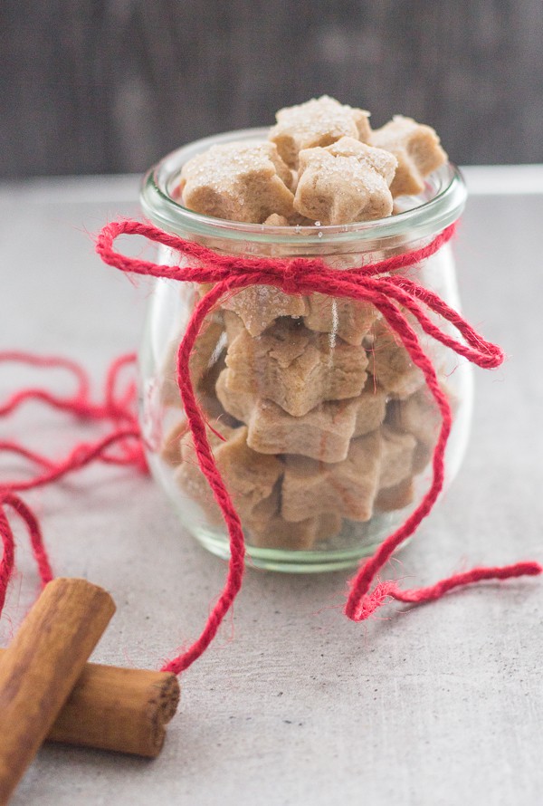 mini star cinnamon sugar cookies in a jar with a red wool bow