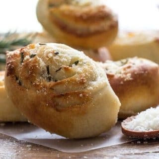Easy Parmesan Rosemary Pizza Pinwheels,a fast and simple pizza dough is served as an appetizer, snack or with dinner.