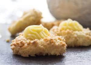 Lemon Thumbprint Cookies are an easy Christmas Cookie Recipe, a buttery lemon base rolled in chopped almonds makes these the best cookies.