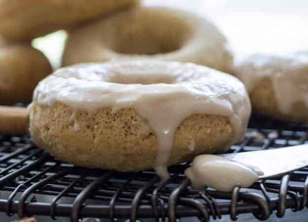Apple Butter Cake Donuts a breakfast,snack or dessert treat, baked soft and light. Topped with a Maple Frosting makes them perfect.