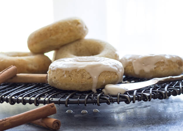 Apple Butter Cake Donuts a breakfast,snack or dessert treat, baked soft and light. Topped with a Maple Frosting makes them perfect.