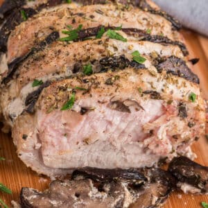 Hasselback pork on a wooden board