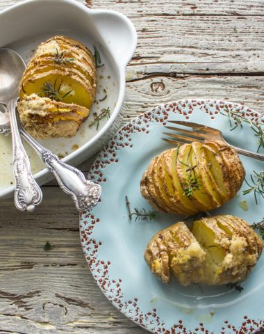 Easy Baked Italian Spiced Parmesan Hasselback Potatoes, the perfect side dish Potato recipe, perfectly spiced and cheesy.