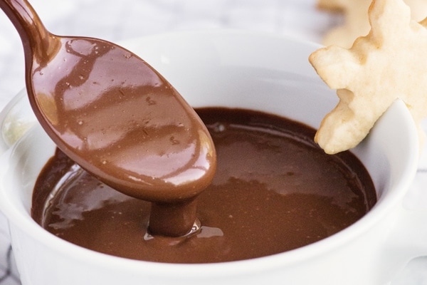 a spoon dipped into Italian hot chocolate