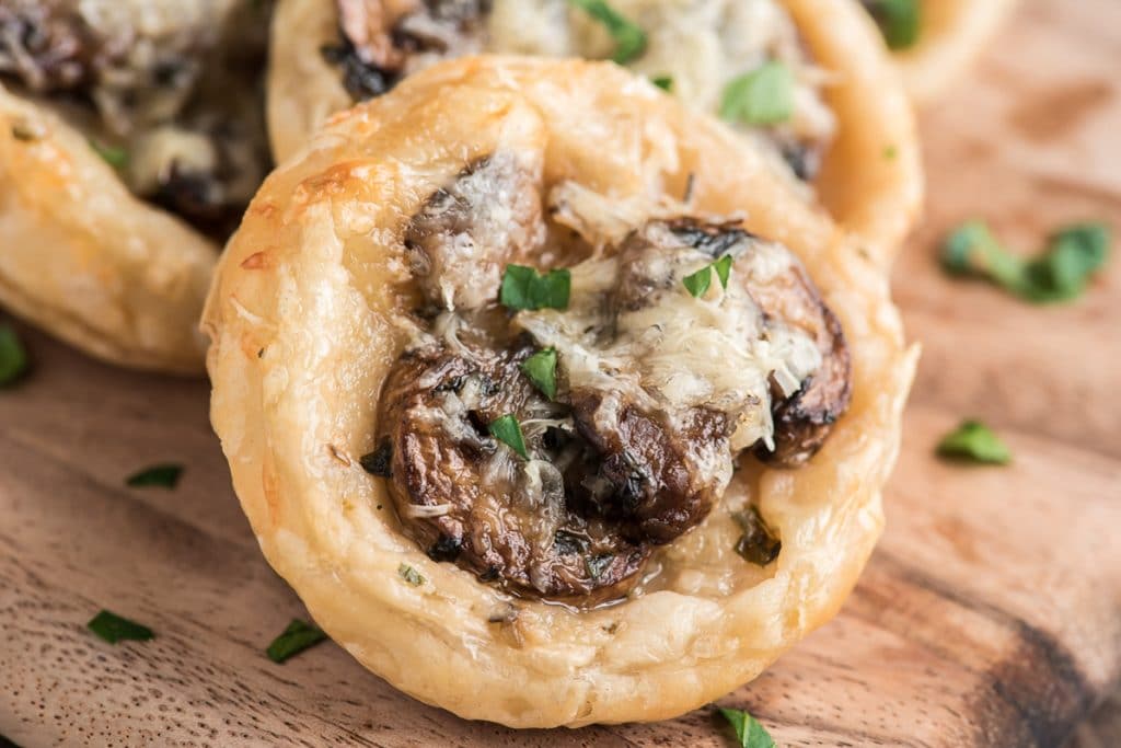 Upclose mushroom puff pastry tart.