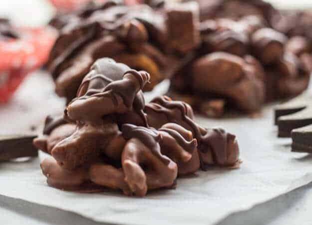 Loaded Double Chocolate Clusters, fast and easy almond, pretzel and sponge toffee cluster recipe. Milk and dark chocolate make them so yummy.