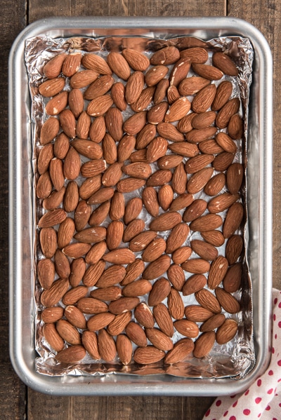 Roasted nuts on a baking sheet.