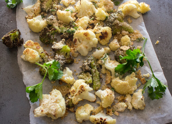 Crusty Parmesan Roasted Cauliflower, a yummy , tasty blend of roasted cauliflower topped with parmesan cheese, breadcrumbs and spices.