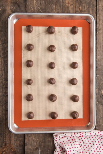 The dough balls on the baking sheet.