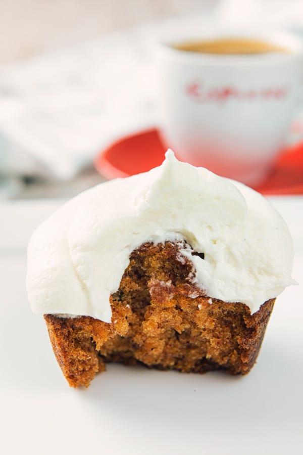 carrot cake muffin with a bite out of it