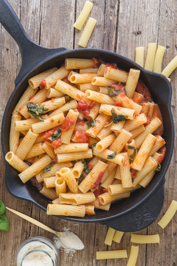 basil pasta sauce in a black pan