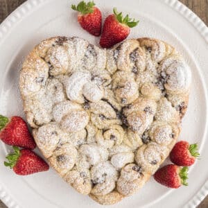 Heart cake on a white plate.