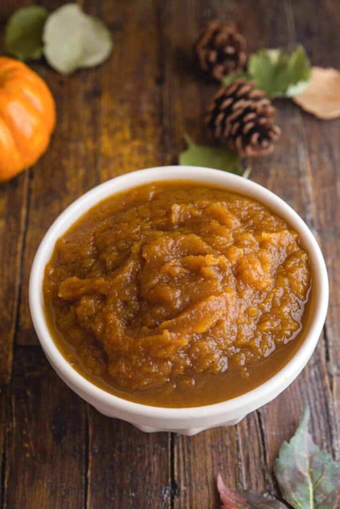 Pumpkin butter in a white bowl.