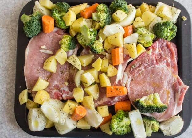 Sheet Pan Italian Pork Chops a fast, easy and healthy dinner recipe idea, veggies of choice make it a family favourite.