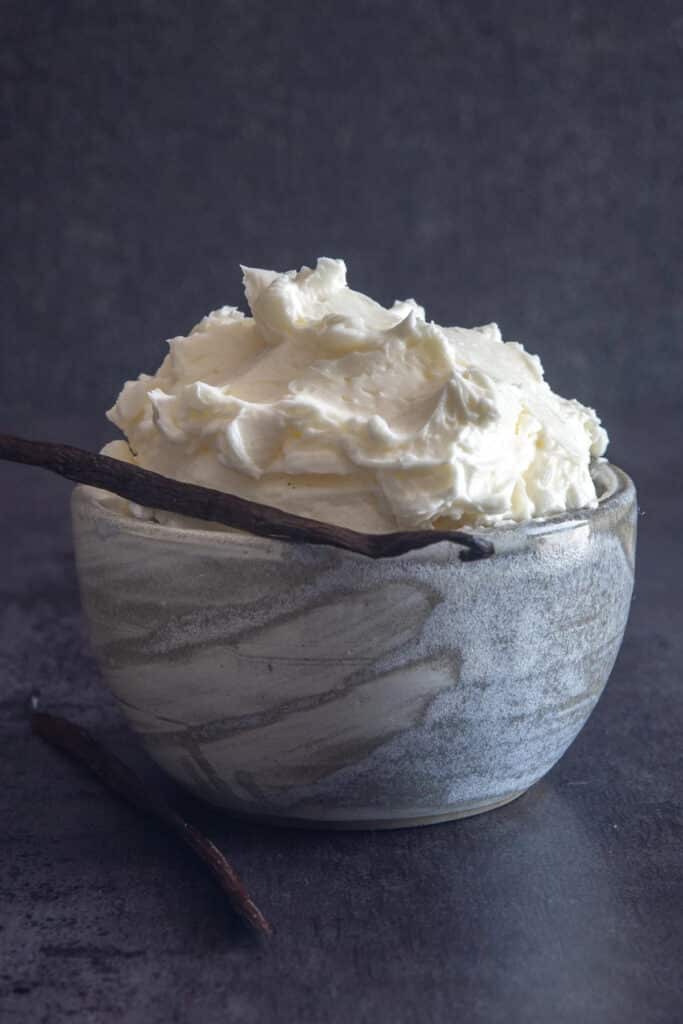 Swiss meringue in a blue bowl.