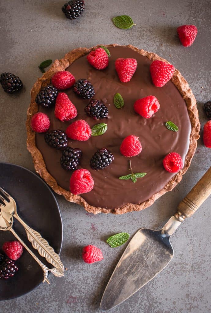 Chocolate pie on a grey pan.