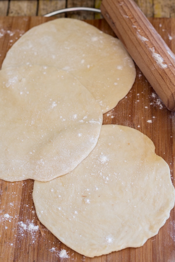 Flat bread dough rolled into circles