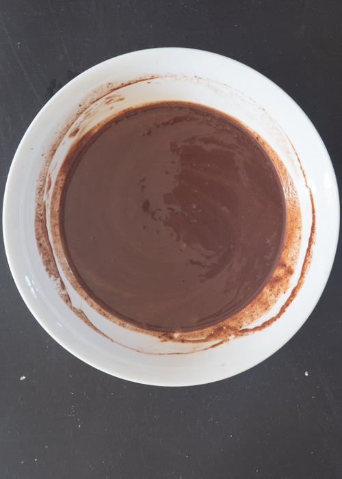 The chocolate in a white bowl melted.