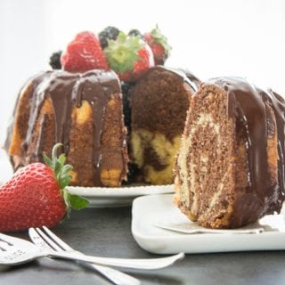 marble cake, chocolate cake with strawberries and blackberries