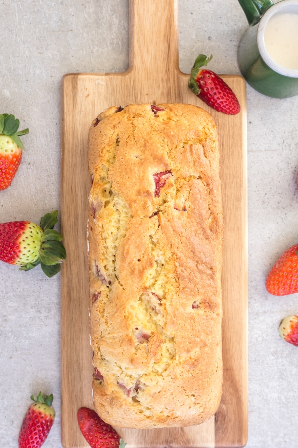 strawberry bread without the glaze on a wooden board