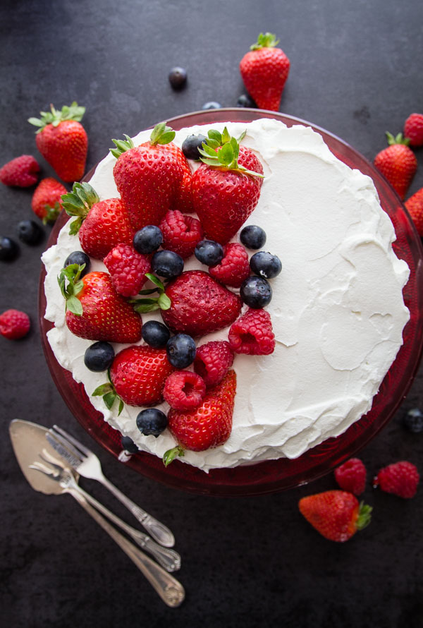 Strawberries and Cream Vertical Layer Cake, a simple fresh fruit and cream dessert recipe, the perfect 4th of July dessert.