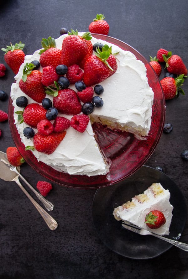 Strawberries and Cream Vertical Layer Cake, a simple fresh fruit and cream dessert recipe, with a how to make video.