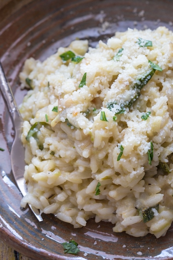 up close zucchini risotto in a pan