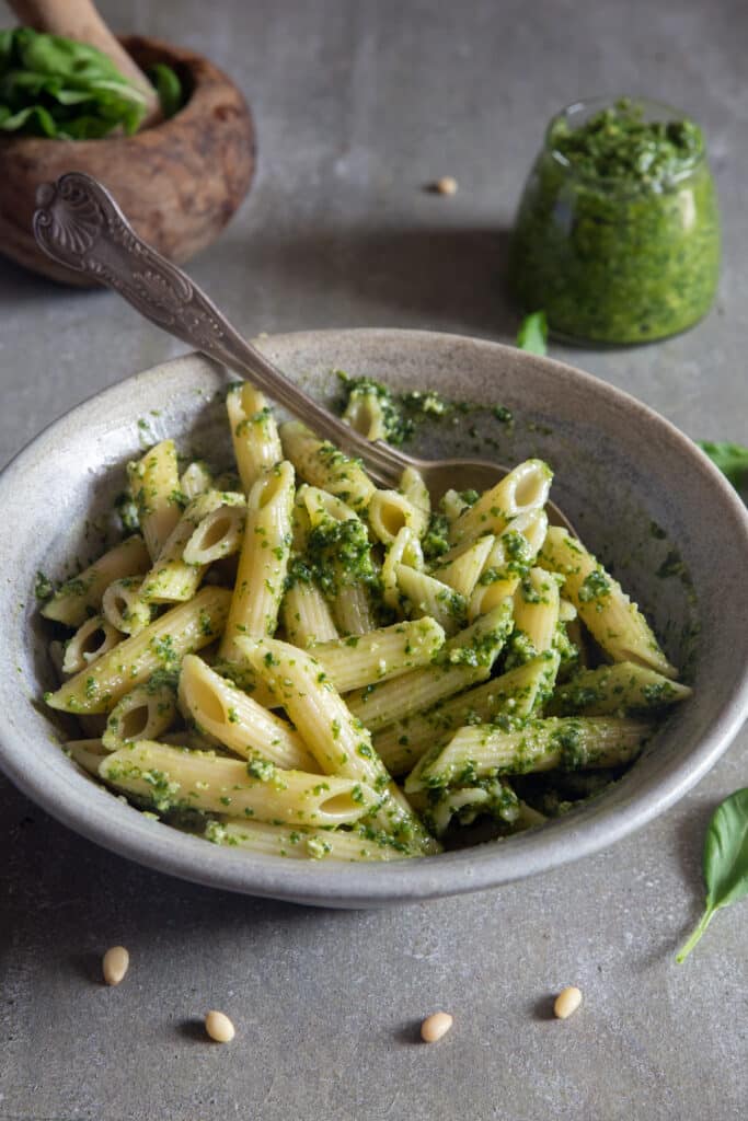 Pesto made with pasta in a bowl.