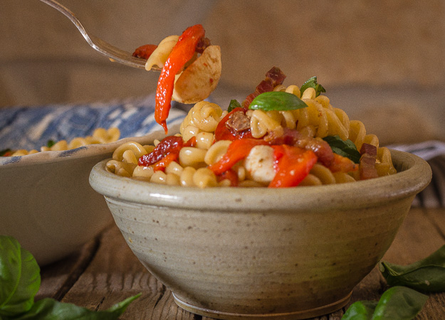 roasted pepper pasta salad in a bowl